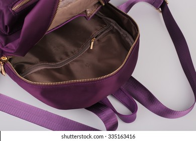 Closeup Picture Of A Empty Opened Purple Backpack.