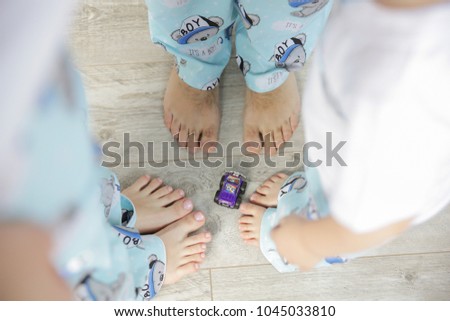Closeup picture of family feets