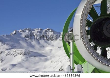 Closeup picture of an  idle snowcannon in the alps