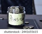A closeup picture of a Image of an old standing on pension corpse with coins. Finance concept