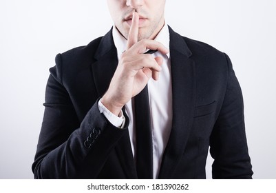 Closeup Picture Of Man Making A Hush Gesture