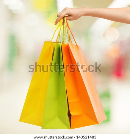 closeup or picture of multi colored shopping bags .