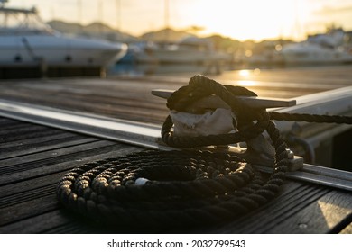 Closeup Picture A Rope Tied To A Metal Cleat On A Yacht Deck Closeup