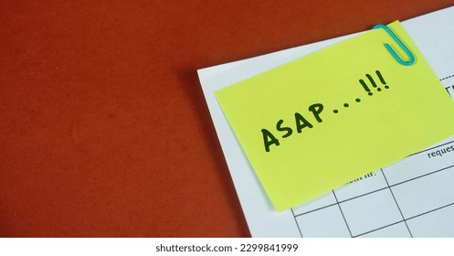 Closeup picture of sticky note on a paperwork, memo or note , reminder, national memo day. - Powered by Shutterstock