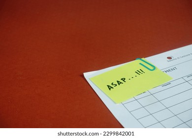 Closeup picture of sticky note on a paperwork, memo or note , reminder, national memo day. - Powered by Shutterstock