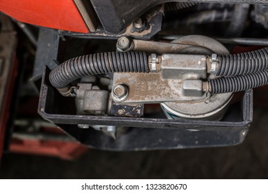 Close-up Picture Of The Top Fuel Filter For The Tractor With The Extension Cable To The Car Body.