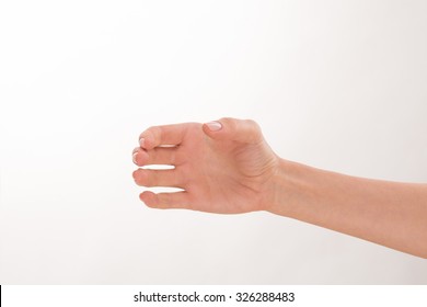 Close-up Picture Of Woman's Hand As If It Is Holding A Bottle. It Is Nice Idea For Advertising Any Fashionable And Popular Drink.