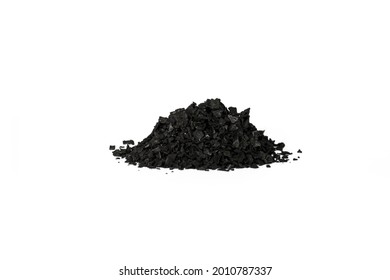 A Closeup Of A Pile Of Activated Carbon Crystals Isolated On A White Background