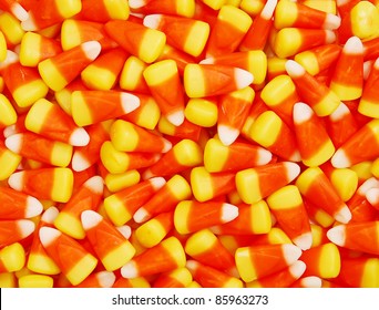 A Closeup Pile Of Colorful Halloween Candy Corn