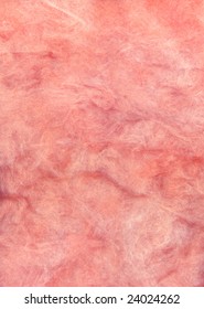 Close-up Of Pink Fiberglass Insulation Material.