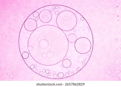 Close-up pink science macro bubbles background,Abstract pink oil bubbles background. Cosmetic liquid beauty product.