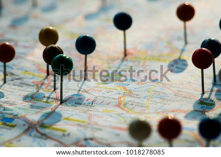 Closeup of pins on the map planning travel journey