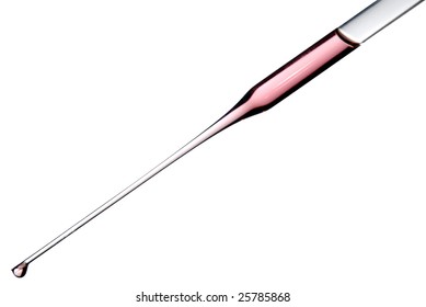 Close-up of pipette with red liquid isolated on white background - Powered by Shutterstock