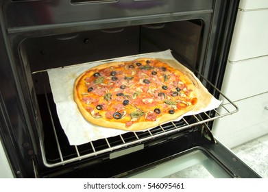 Closeup Of A Pizza Baked In The Oven Rack