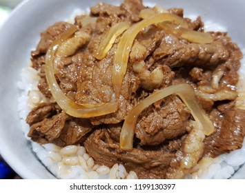 Close-up Of The Plastic Food Sample Of Japanese Boiled Beef Topping On Rice (Gyudon), Showing At The Instant Kitchen Recipes Corner In A Supermarket.