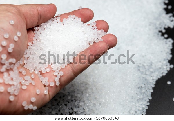 Close-up of plastic polymer\
granules. polymer plastic. compound polymer.\
plastic\
beads