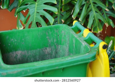 Close-up of a plastic storage container handle with a soft blurred background