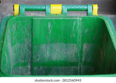 Close-up of a plastic storage container handle with a soft blurred background