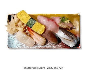 Close-up of a plate of assorted sushi, including various types of fish, shrimp, and tamago (sweet egg). Perfect for showcasing Japanese cuisine and food photography - Powered by Shutterstock