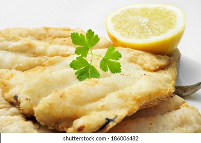 Closeup Of A Plate With Battered And Fried Hake