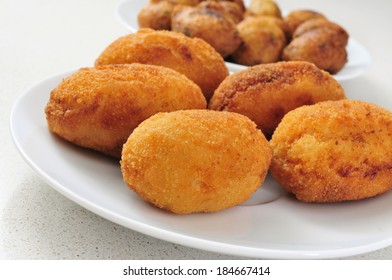 closeup of a plate with croquetas, spanish croquettes