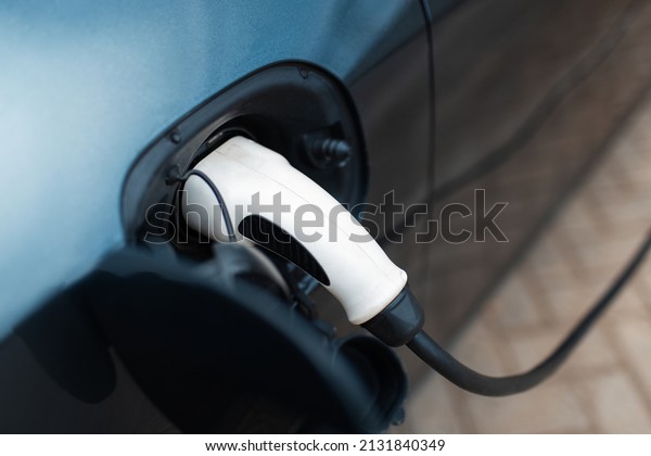Close-up of\
plug for electric car on charging\
station.