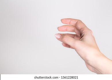 Closeup point of view outstretched female single hand of woman isolated on grey background. Horizontal color photography. - Powered by Shutterstock