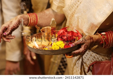 Closeup of pooja thali in hands