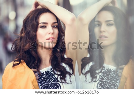 Similar – Close-up portrait of young brunette woman