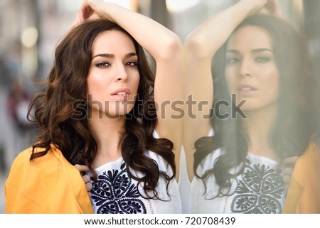 Similar – Close-up portrait of young brunette woman