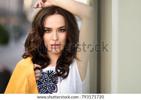 Similar – Close-up portrait of young brunette woman