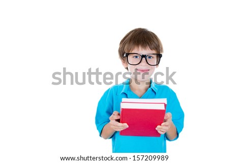 Closeup portrait of adorable young boy with big black glasses holding books, isolated on white background with copy space