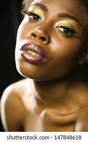 Closeup portrait of an African American woman with highfashion makeup