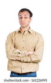 Closeup Portrait Of Angry, Mad, Pissed Off Handsome Man In Brown Shirt With Arms Crossed Folded, Isolated On White Background. Negative Human Emotions And Facial Expressions.