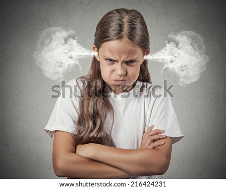 Closeup portrait Angry young girl Blowing Steam coming out of ears about to have Nervous atomic breakdown isolated grey background. Negative human emotions Facial Expression feeling attitude reaction