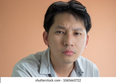 Closeup Portrait Asian Man Looking Somthing Look Like Thinking Deeply For Some Ideas, Sign Of Body Language And Face Expression