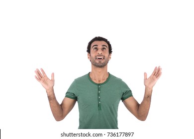 Close-up Portrait Of An Astonished Man With Outstretched Hands And Looking To Up. Isolated On White Background.