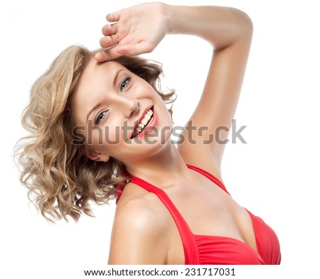 closeup portrait of attractive  caucasian smiling woman blond isolated on white studio shot lips toothy smile face hair head and shoulders looking at camera blue eyes tooth