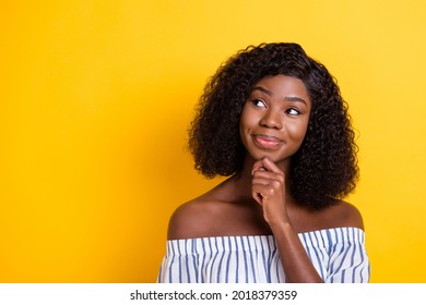 Close-up portrait of attractive curious girl creating new solution copy space isolated over bright yellow color background