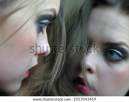  closeup portrait of attractive woman near the mirror , selective focus          