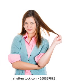 Closeup Portrait Of Attractive Woman Twirling Hair In Fingers Upset Plotting Revenge, Isolated On White Background. Negative Human Emotion Facial Expression Feelings, Attitude