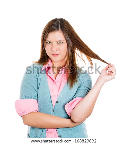 Closeup portrait of attractive woman twirling hair in fingers upset plotting revenge, isolated on white background. Negative human emotion facial expression feelings, attitude