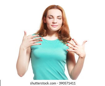 Closeup portrait of attractive woman wafting air to nostrils to smell better, isolated on white background - Shutterstock ID 390571411