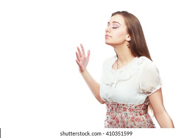 Closeup portrait of attractive woman wafting air to nostrils to smell better, isolated on white background - Shutterstock ID 410351599