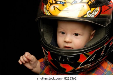 baby in motorcycle helmet