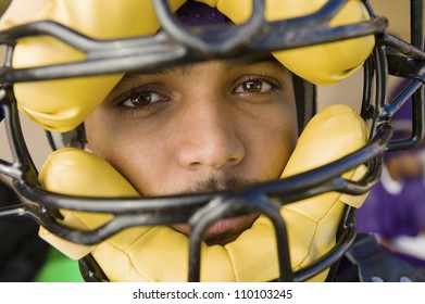 Close-up Portrait Of A Baseball Catcher Wearing A Mask