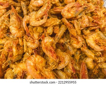 A Close-up Portrait Of A Basket Of Fried Fish