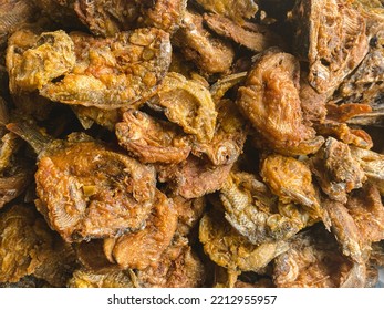 A Close-up Portrait Of A Basket Of Fried Fish