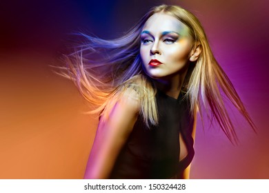 Close-up portrait of beautiful and fashion woman with Professional makeup and hairstyle i, studio shot