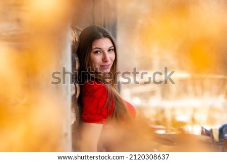 Similar – Image, Stock Photo Smiling girl with a hat pulling from her boyfriend hand in the street to take a walk.